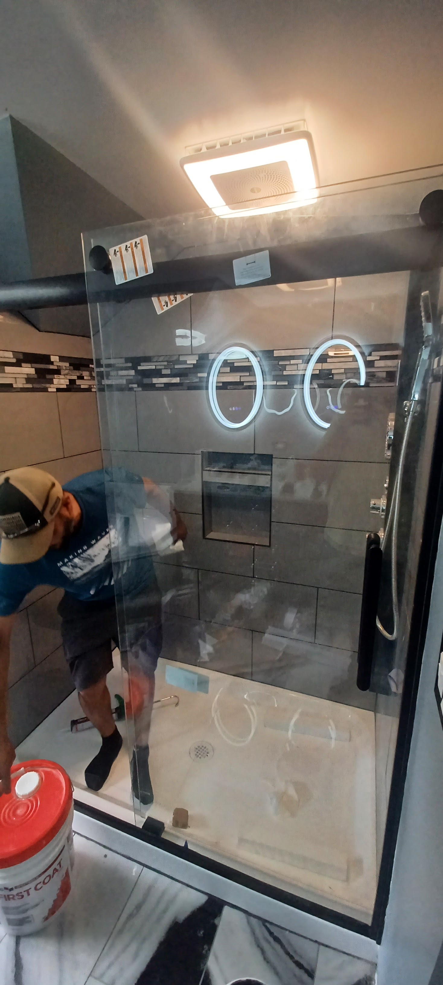 Frameless glass shower door installation